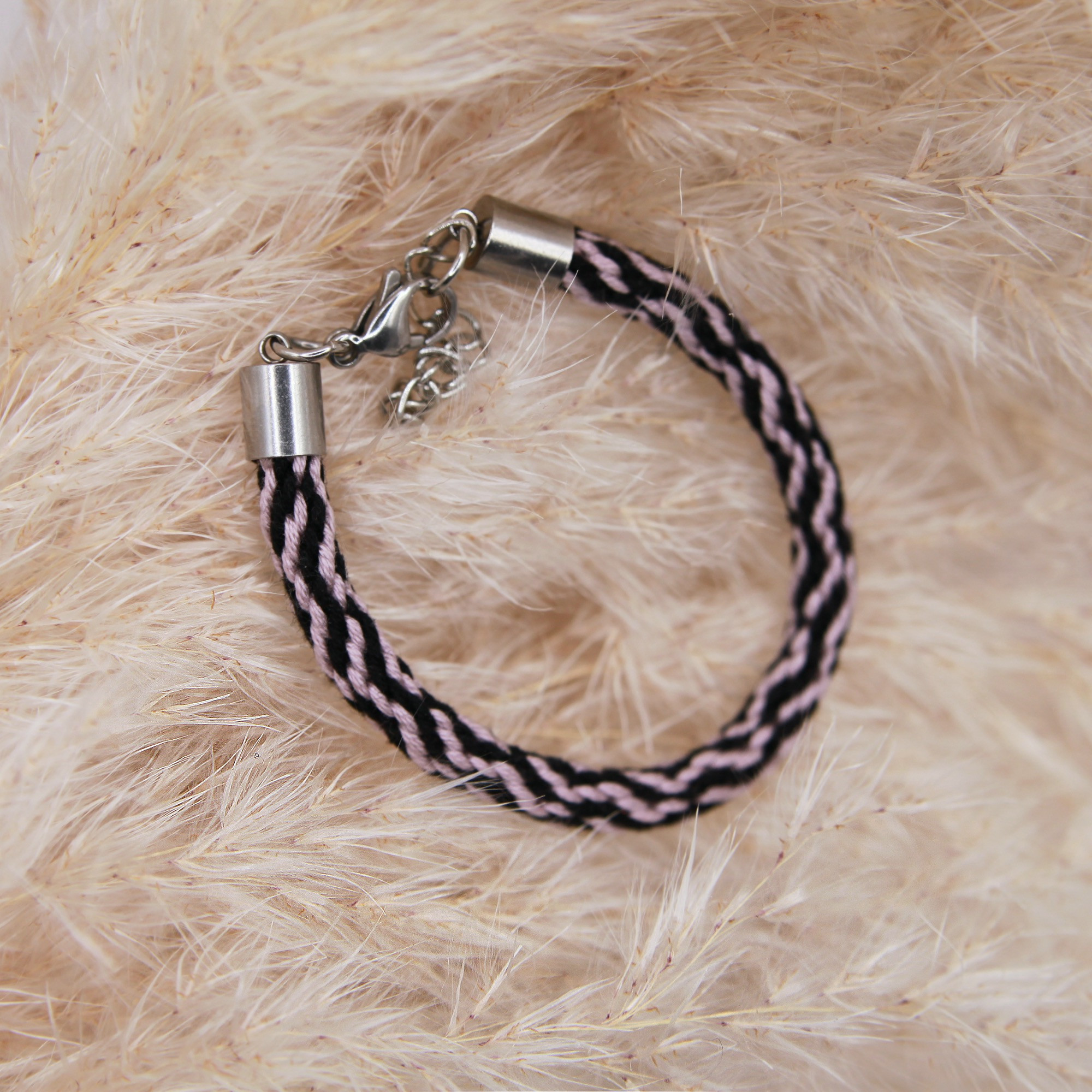 Armband Kumihimo, rosa-schwarz
